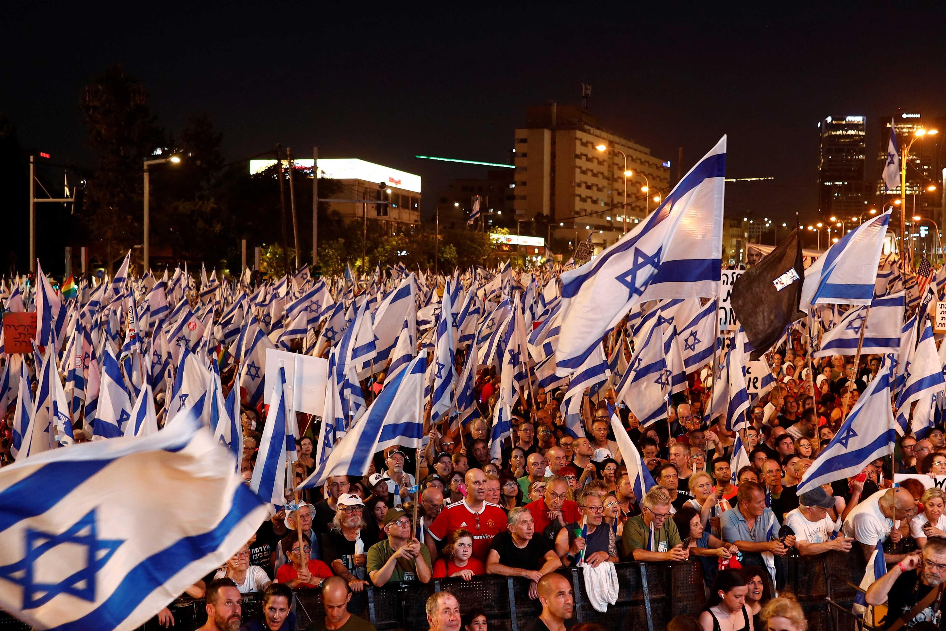 People take part in a demonstration against Israeli Prime Minister Benjamin Netanyahu and his nationalist coalition government's judicial overhaul, in Tel Aviv, Israel July 15. Photo: Reuters