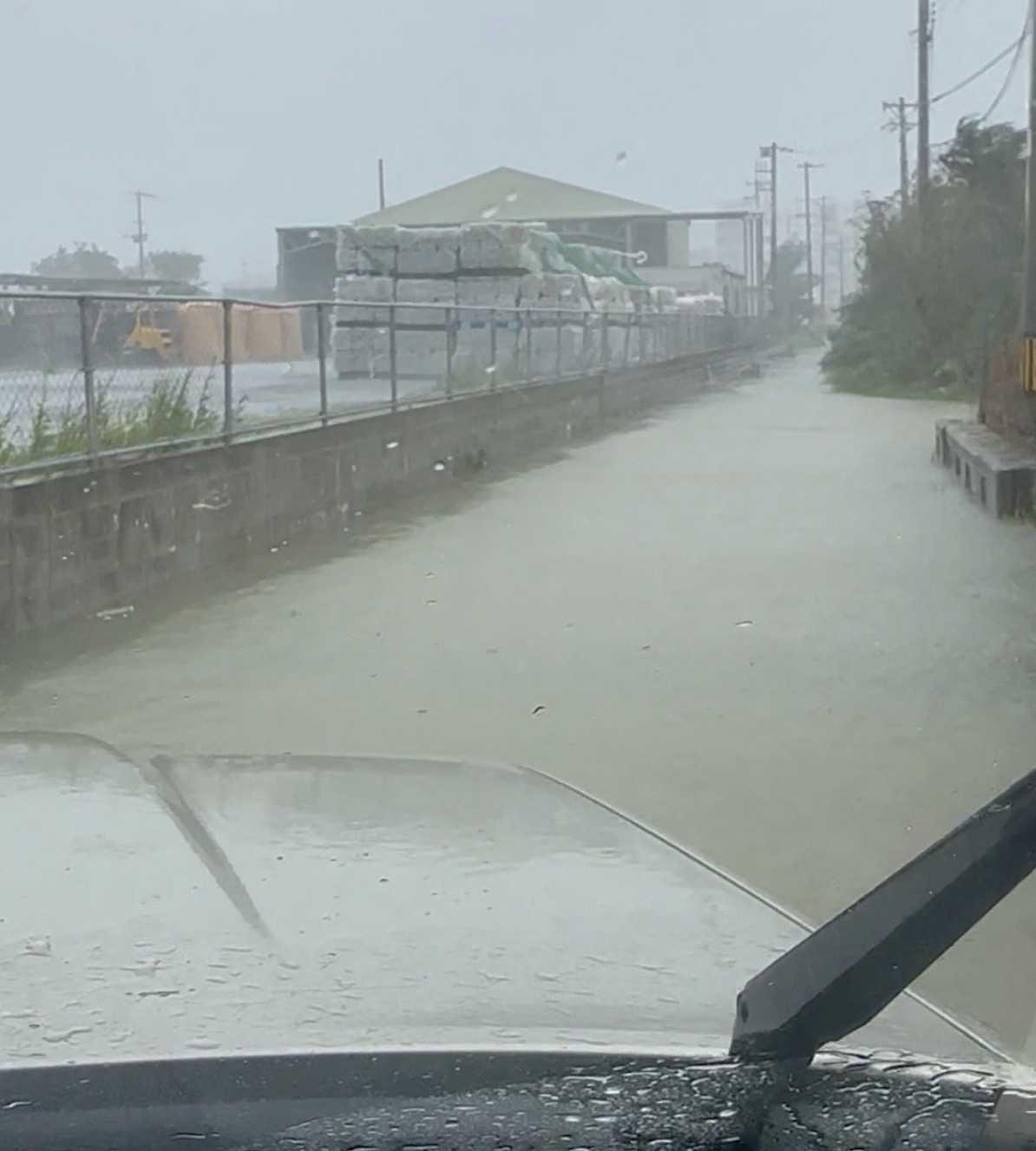 A view of a flooded road following Typhoon Khanun in Nago, Okinawa prefecture, Japan, on Aug 2, in this screengrab taken from a social media video. Photo: Reuters