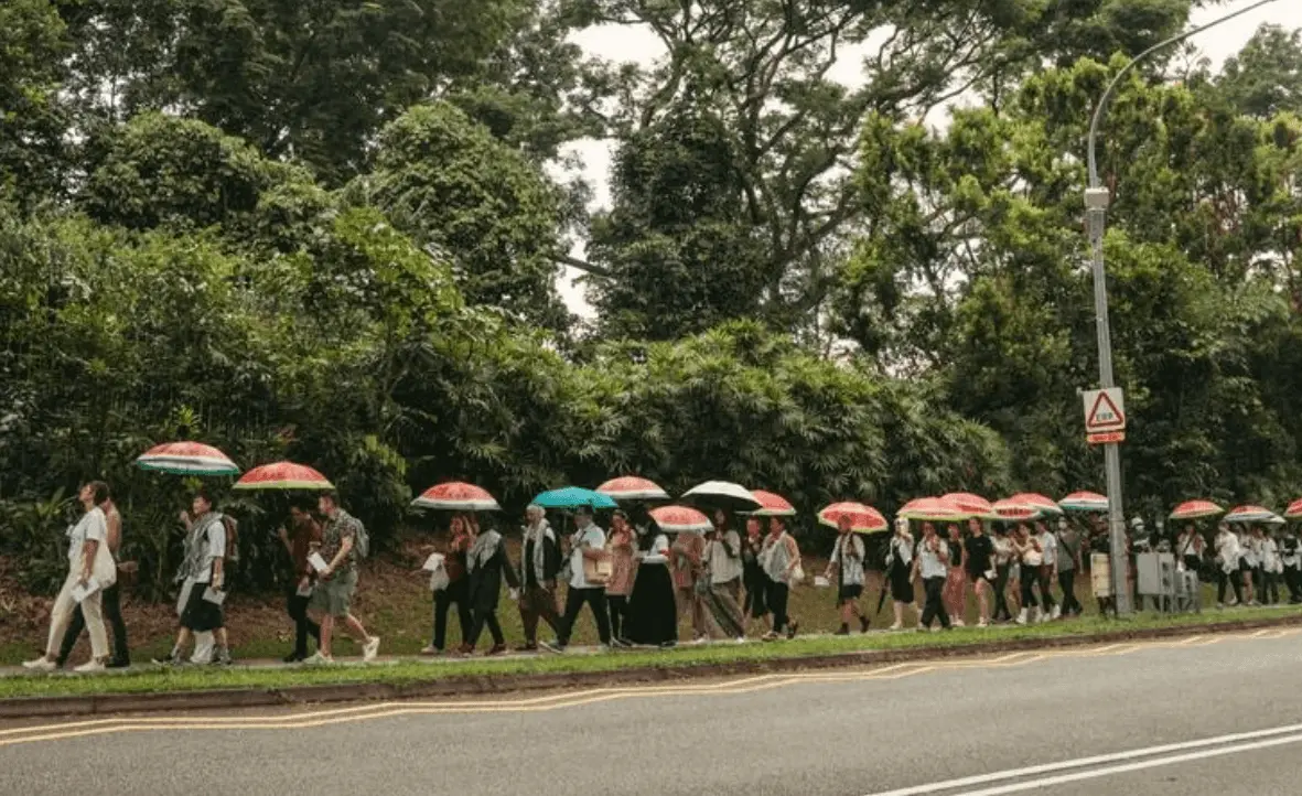 A group of Singaporeans making their way to the Prime Minister's Office on Feb 2, 2024, to deliver letters urging the prime minister to end military ties with Israel. Photo: TJC