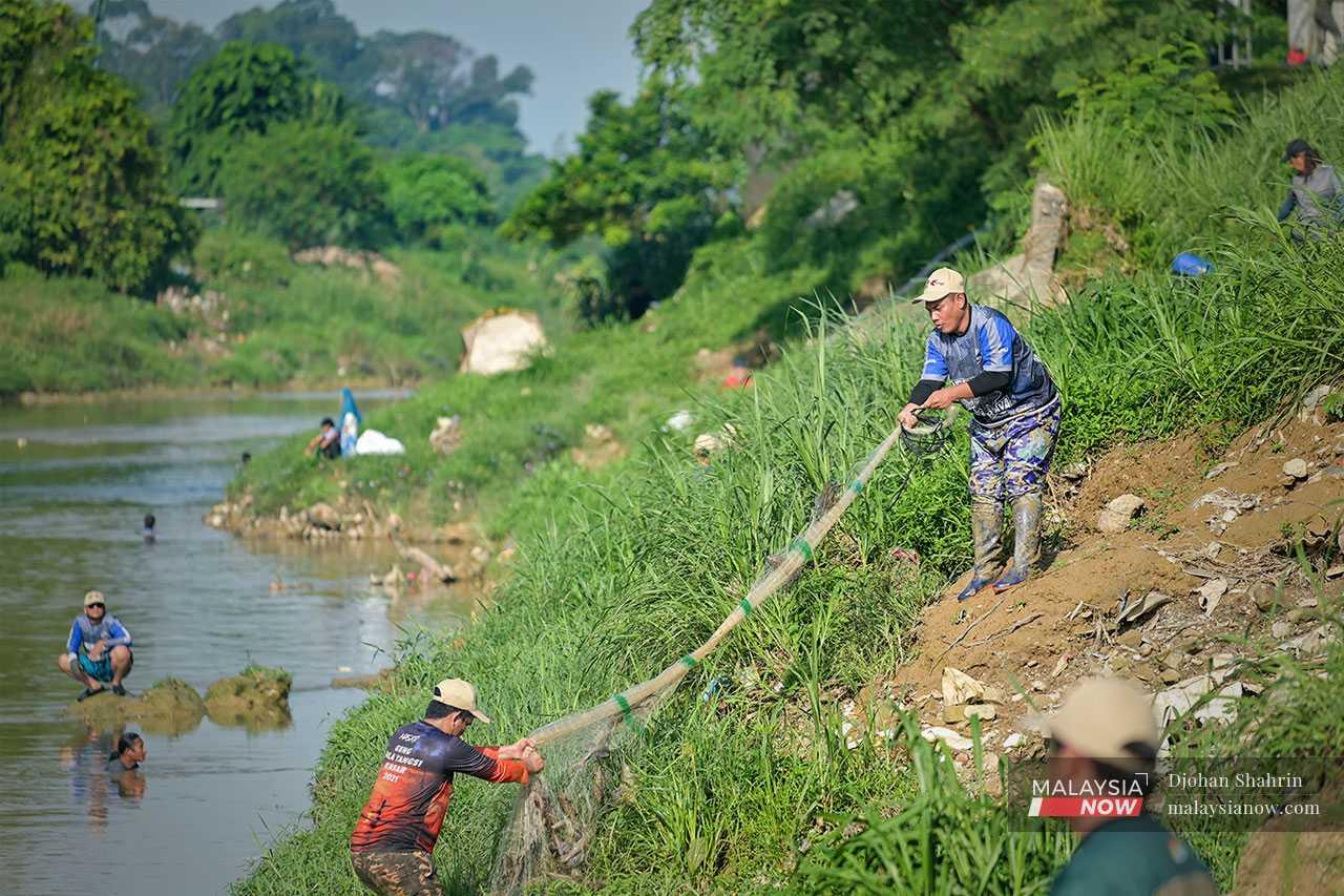 Every once in a while, they pull in their nets to check on their catch.