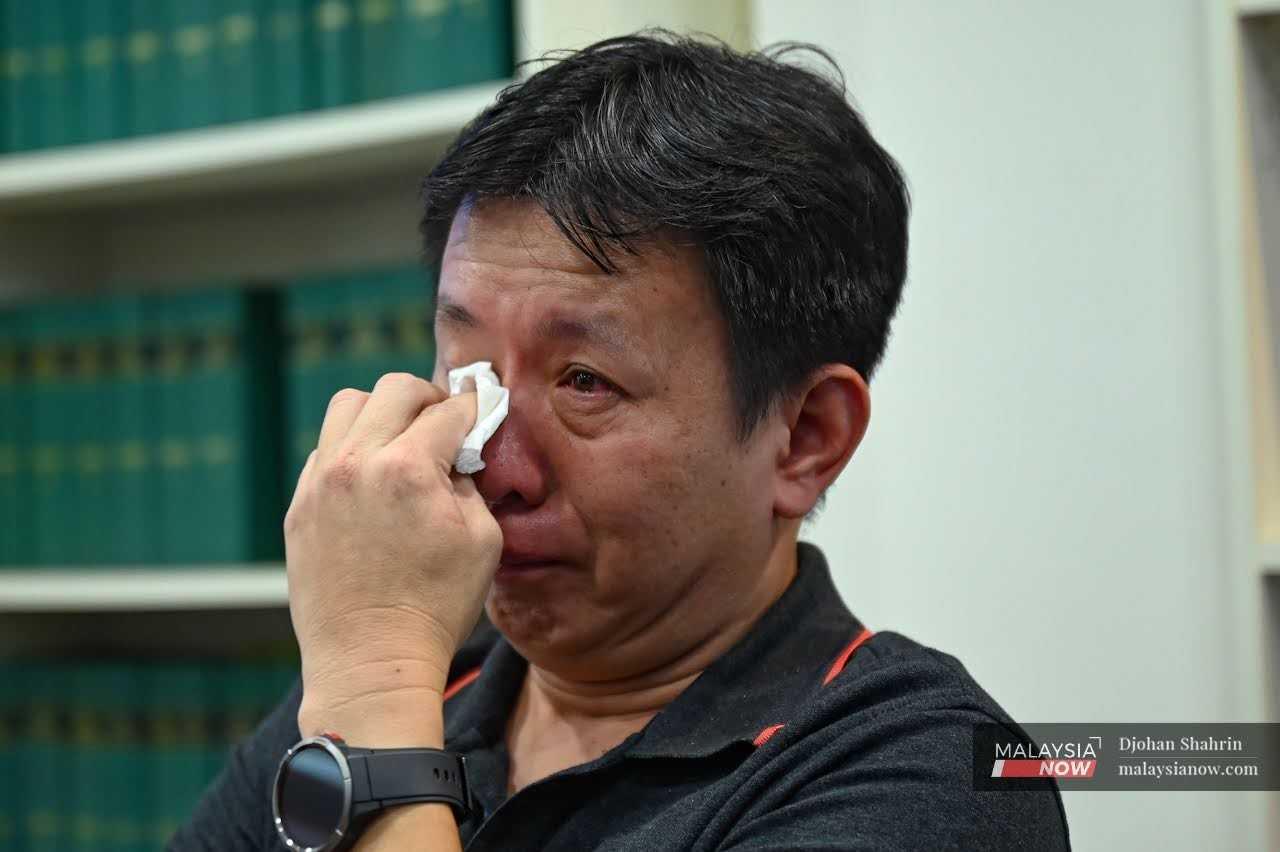 Grab driver Ong Ing Keong tears up during a press conference by LFL on Aug 14 as he recalls how he was assaulted by an officer accompanying a royal entourage.