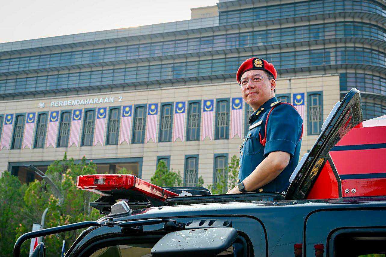 Nga Kor Ming, seen here making an appearance at the National Day parade in a Bomba uniform, has been accused of abusing his ministerial powers. Photo: Facebook