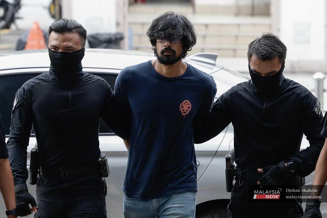 Yusoff Rawther arrives at the Kuala Lumpur court complex.