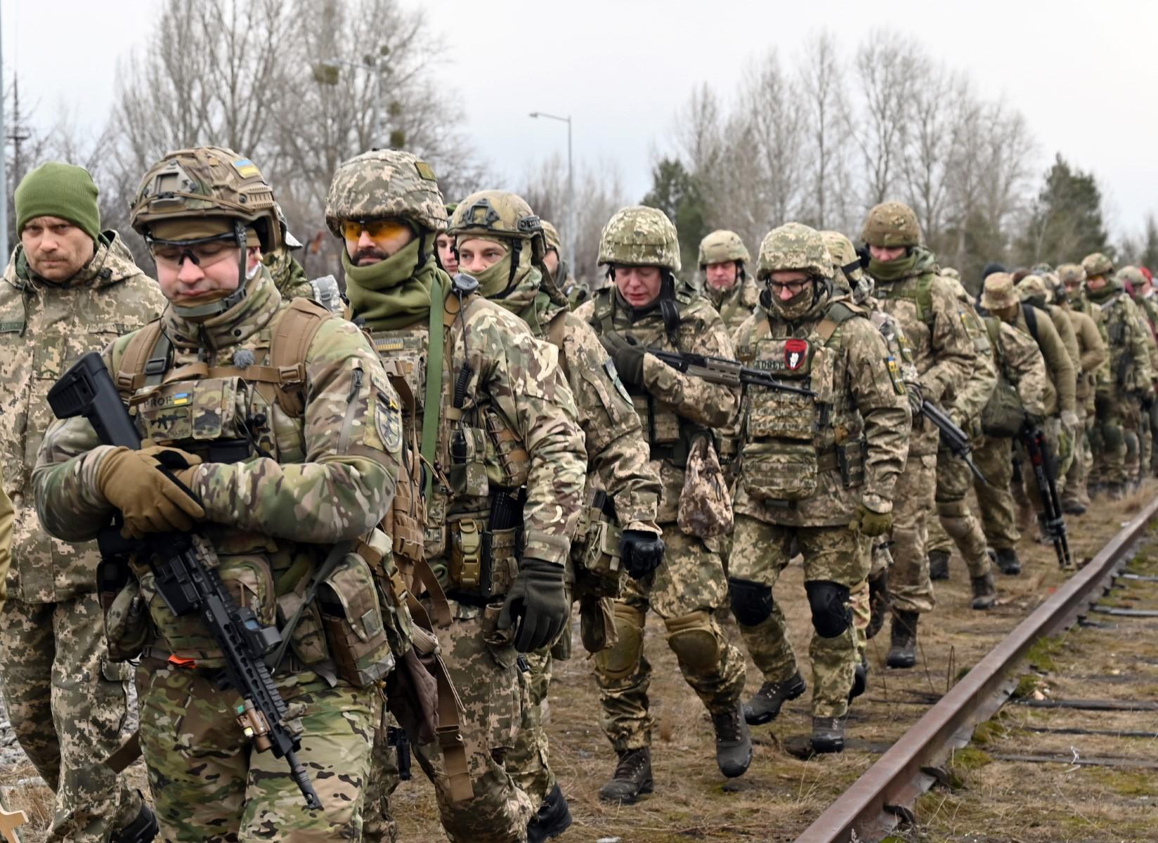 The Ukrainian Territorial Defence Forces, the military reserve of the Ukrainian Armed Forces, take part in a military drill outside Kyiv on Feb 19. Photo: AFP