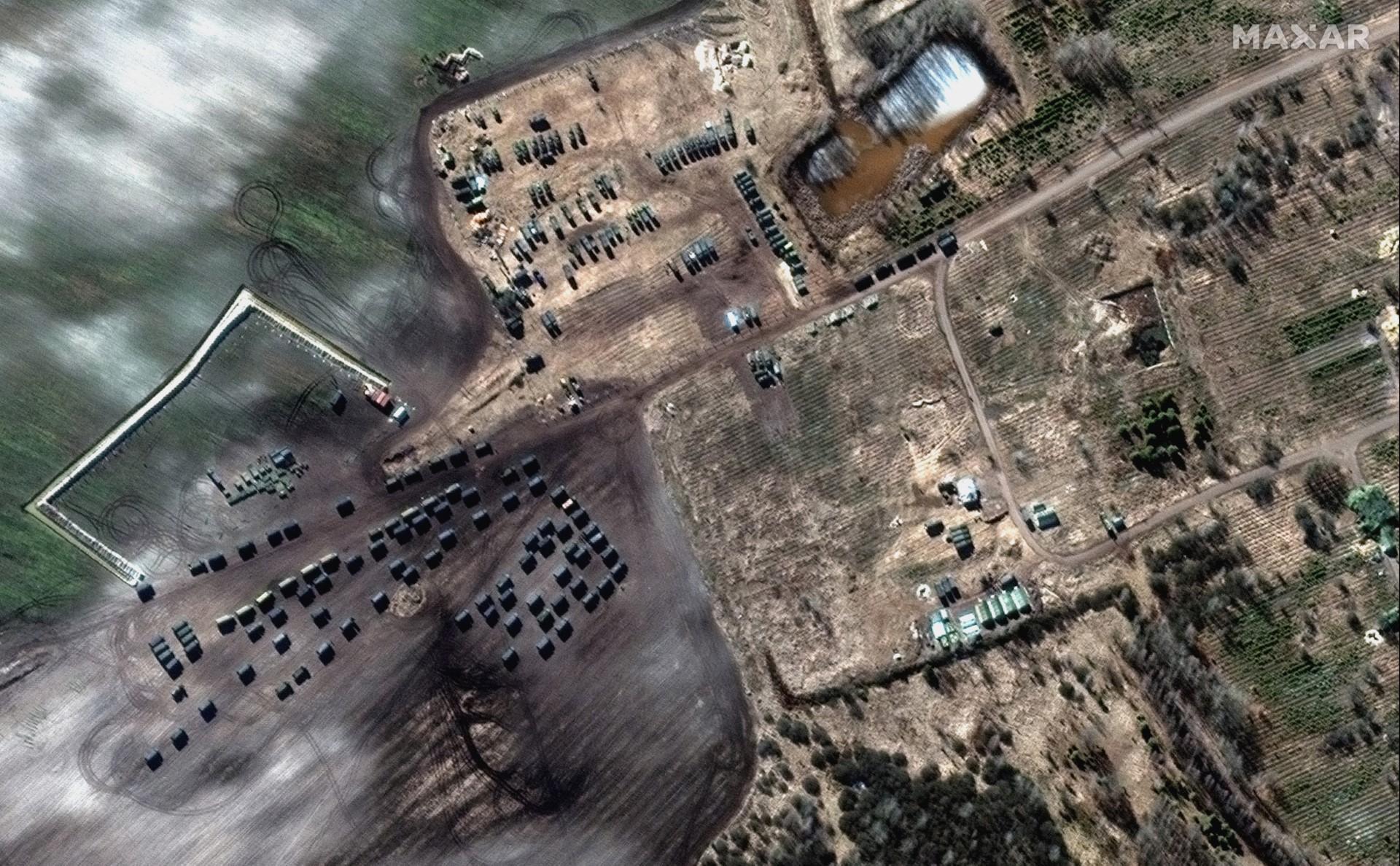 This Maxar satellite image taken and released on Feb 28, ground forces field deployments and a convoy in Khilchikha, Belarus, north of the border with Ukraine. Photo: AFP